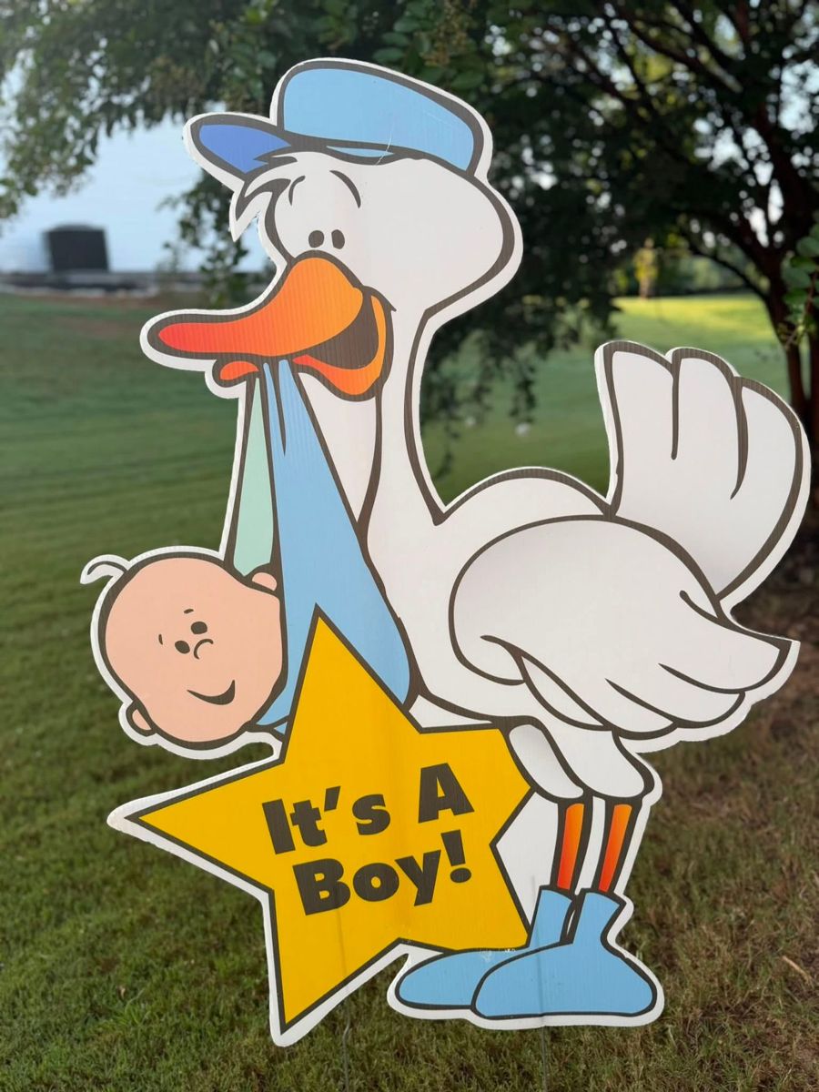 Stork cutout carrying a baby with an It's a Boy star